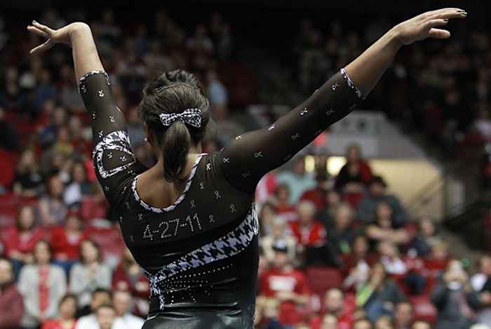 An Alabama gymnast wears a leotard sporting "4-27-11" in memory of the devastating tornadoes that swept through Tuscaloosa